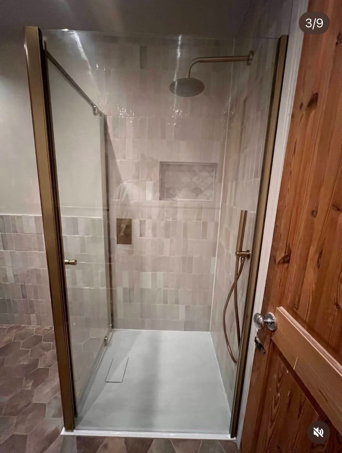Walk-in tiled shower enclosure