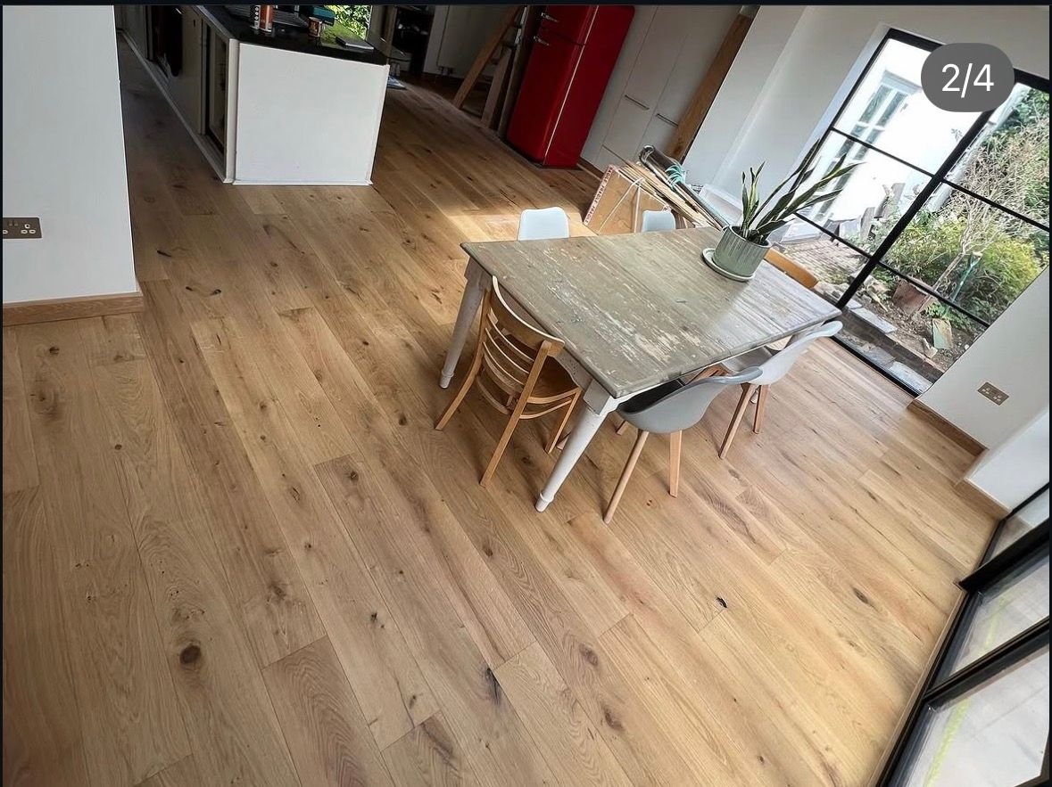 Wood floor in a kitchen and dining space