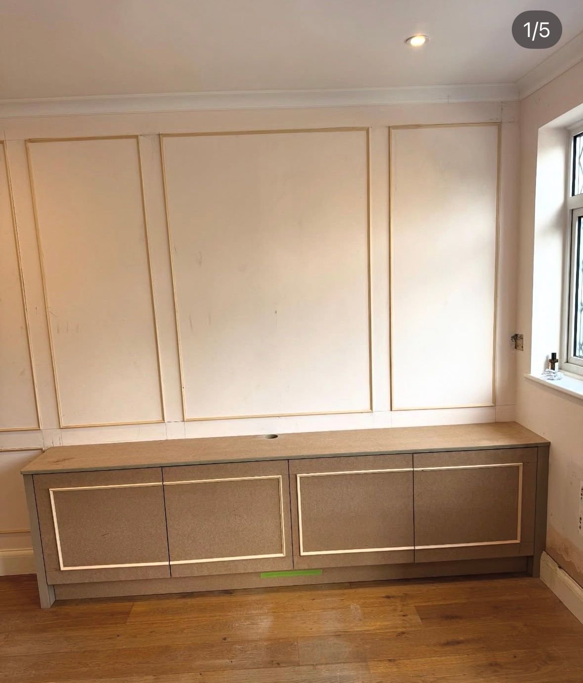 White shaker panelled feature wall