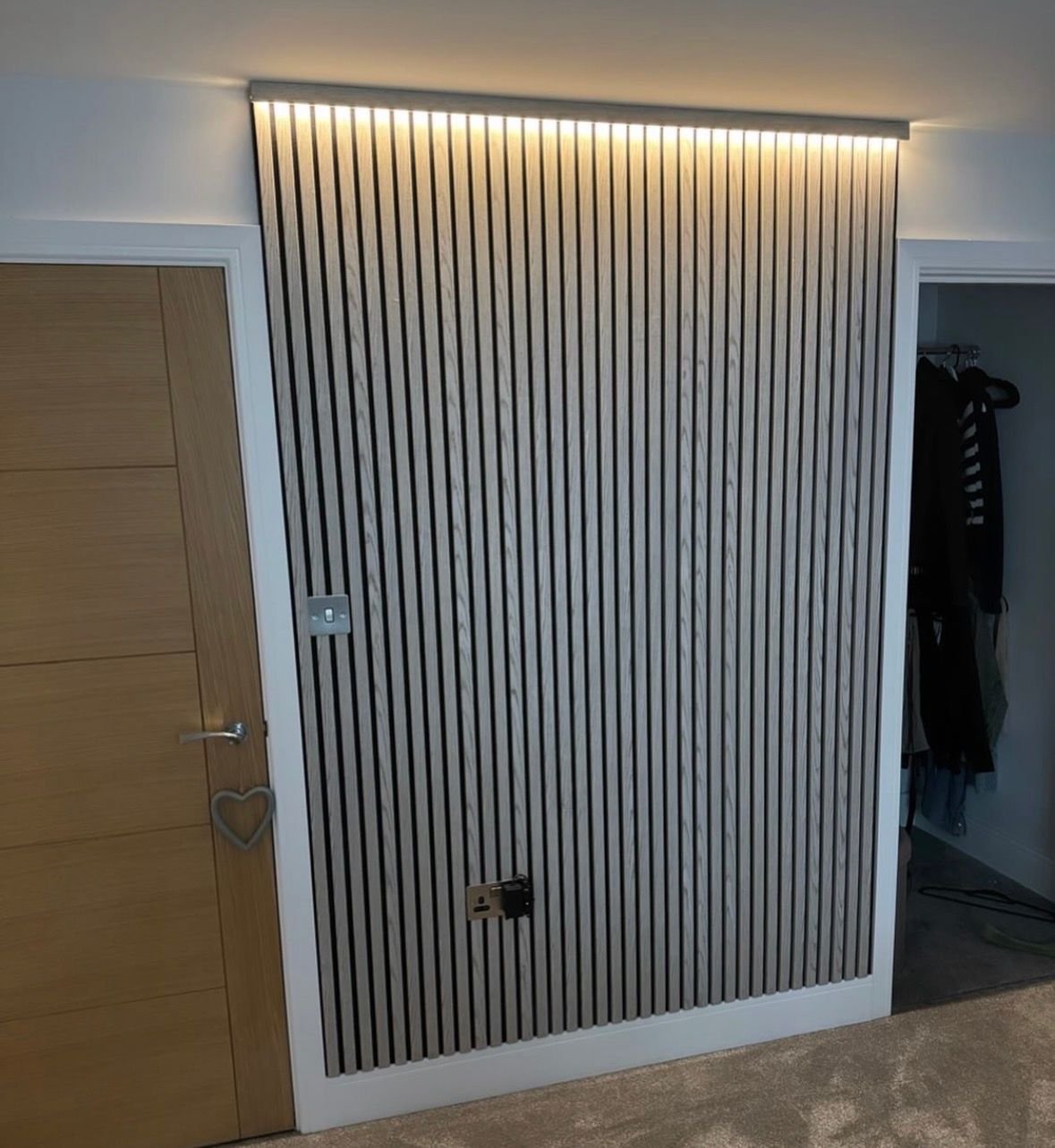 Slatted timber feature wall with LED lighting